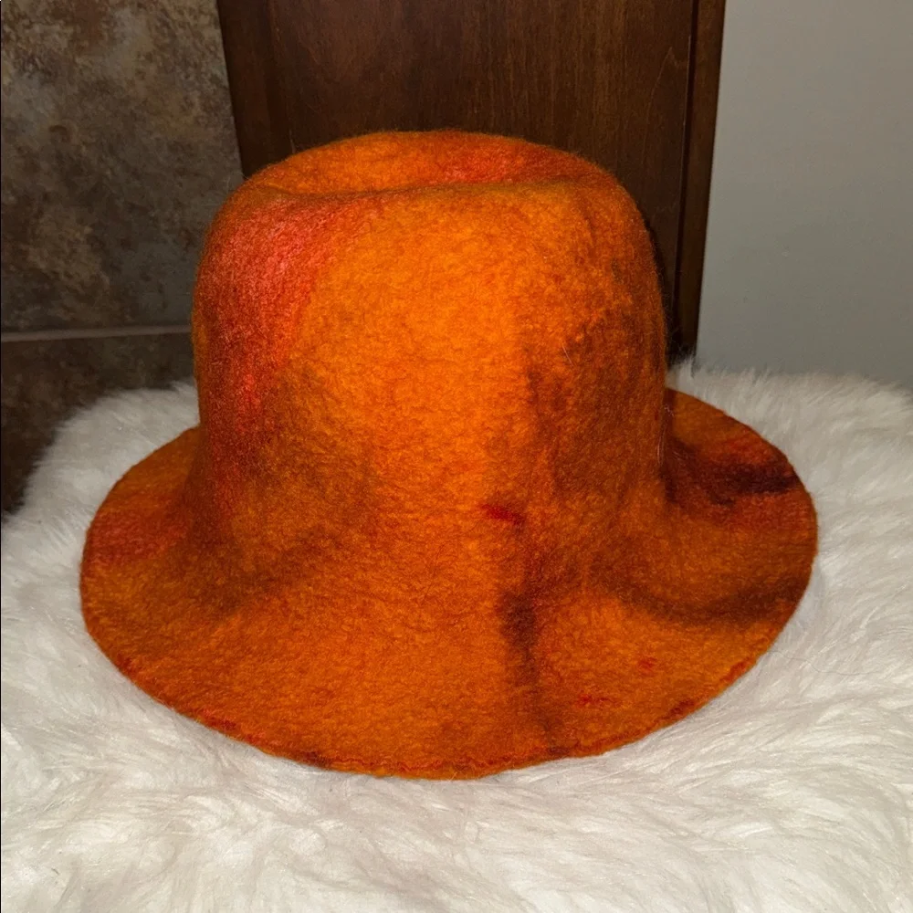 Camilla Krueger Designs orange marbled artisan hand-felted wool sculptural hat